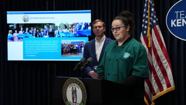Sarah Young, a Second Chance employee at Kentucky Dam Village Park, speaks at a Team Kentucky press conference in Frankfort earlier this year. (Anita Hatchett)